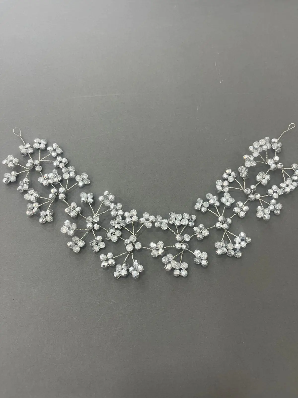 Nell flexible headpiece